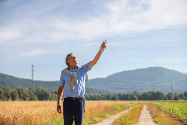 istock Caucasian Senior Man Flying A Kite 1327268476
