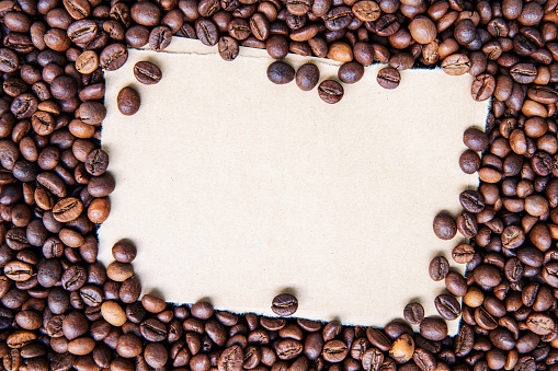 Blank brown paper on the coffee beans