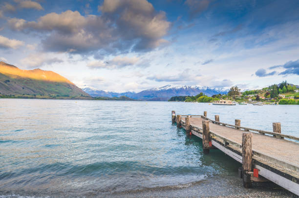 istock Wooden bride relaxing scenics at wanaka at evening 1327272200