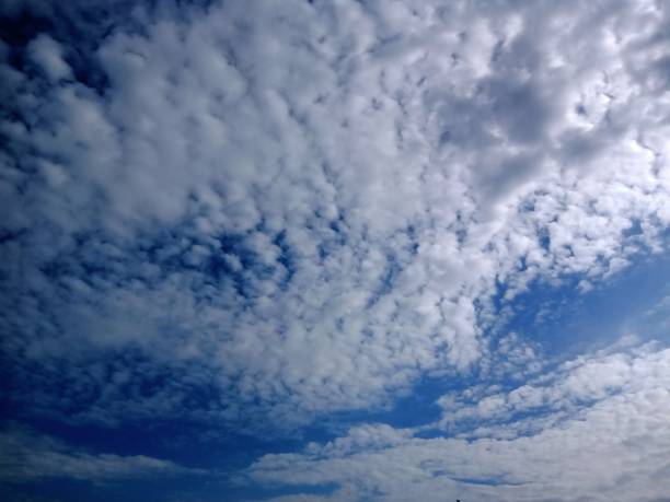 istock Full frame of blue sky and clouds 1327273670