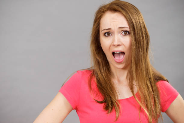 istock Shocked and surprised woman 1327275102