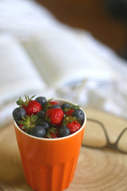 istock Berries, Book and Glasses 1327276846
