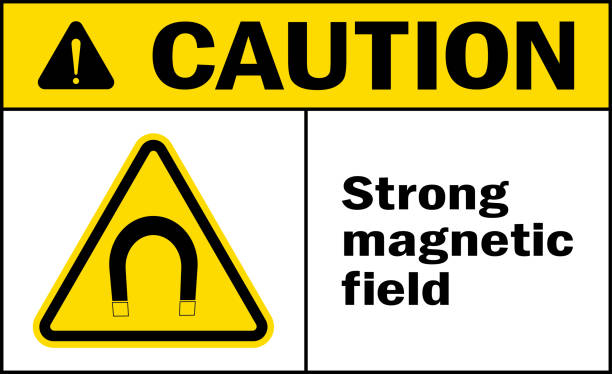Strong magnetic field area caution sign. Strong magnetic field area caution sign. Electrical hazard signs and symbols. magnetic field stock illustrations