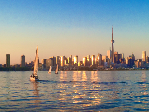 The Toronto Ontario Canada skyline as seen from Lake Ontario at Golden Hour