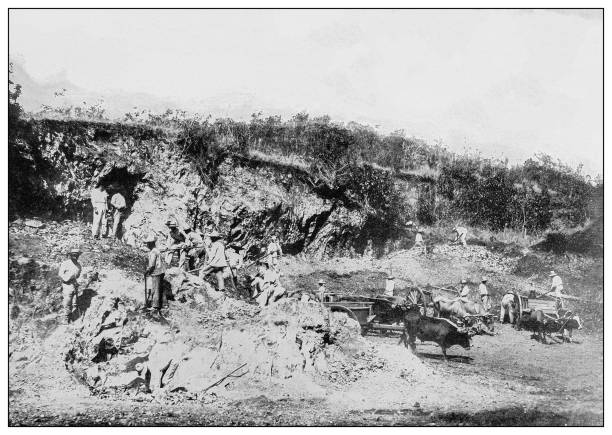 Antique black and white photograph of people from islands in the Caribbean and in the Pacific Ocean; Cuba, Hawaii, Philippines and others: el Cobre copper mines, Cuba