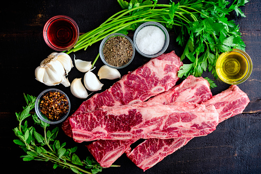 Flanken beef spare ribs, parsley, and other raw ingredients