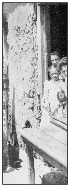 istock Antique black and white photograph: People in Cuba 1327292486