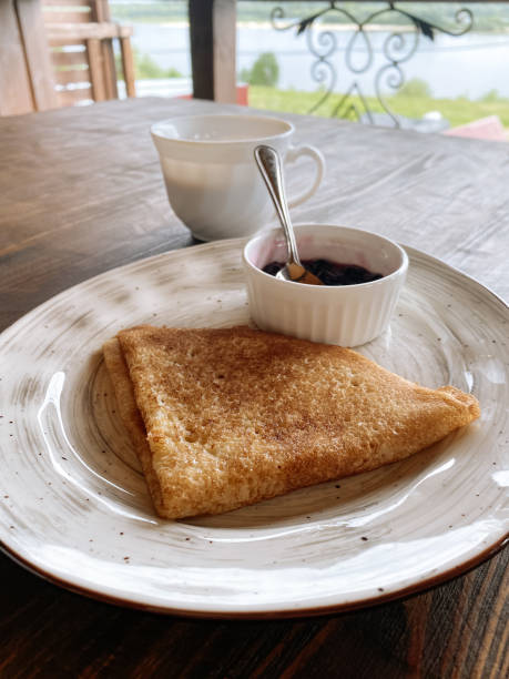 istock plate of russian pancake with jam 1327298430