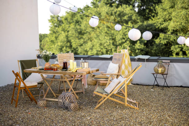 istock Beautifully decorated roof terrace with a dining table 1327299019