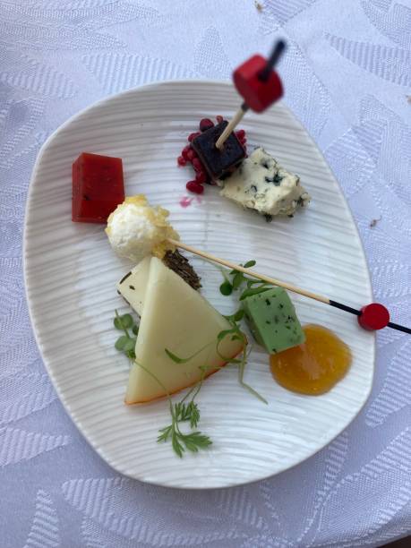 istock Assorted assortment of cheeses on a plate 1327299971
