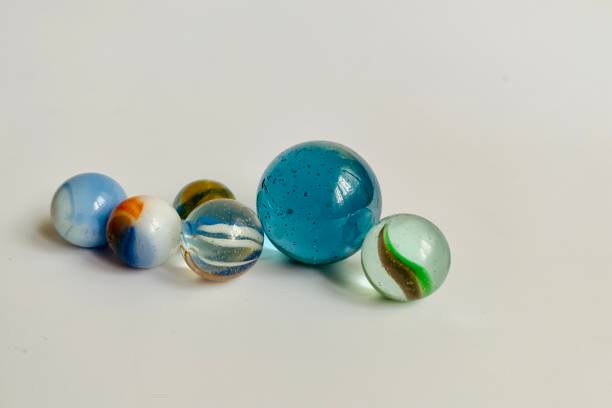 Glass marbles in white background
