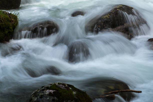 istock A stormy mountain river flows like a waterfall over the stones 1327300965