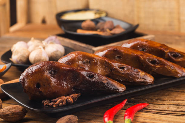 istock Delicious spiced duck head on a plate 1327301064