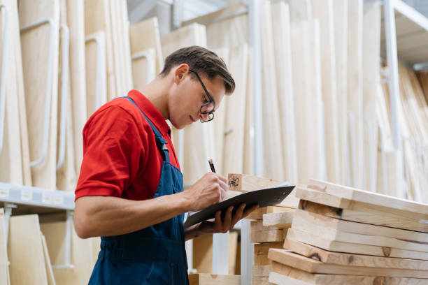 istock floor coverings store supervisor making notes on the clipboard 1327304476