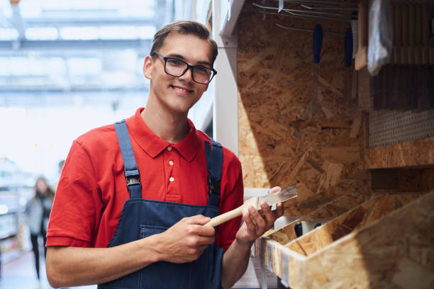 istock supervisor with a clipboard standing near boxes of nails 1327304758