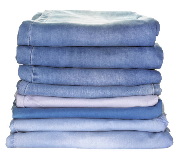 jeans of various fabrics lie in a pile on a white background, isolate - patch textile stack heap imagens e fotografias de stock