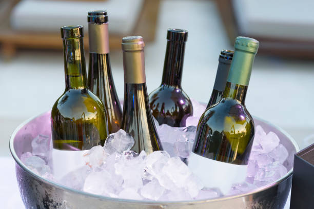 istock White wine bottles in bowl of ice 1327307210