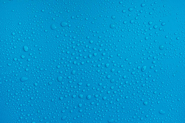 istock water drops close up on blue background 1327307671