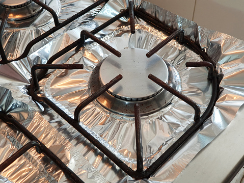 Domestic stove and lined with suitable aluminum foil.