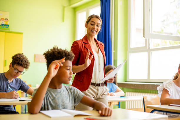 istock Young boy is sitting and waiting for teacher's help. 1327311691