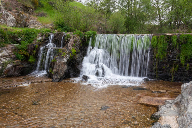 istock A beautiful waterfall on the natural swimming pool in Arrago river 1327313303