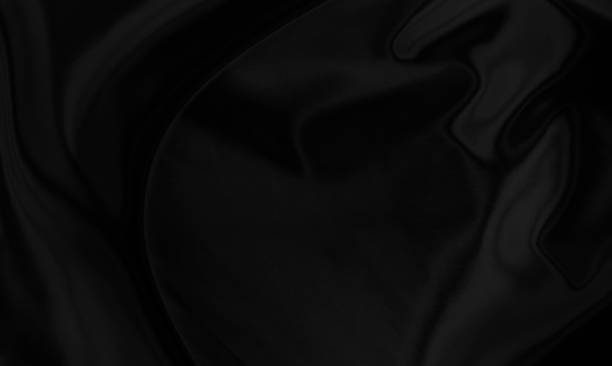 istock Black gray satin dark fabric texture luxurious shiny that is abstract silk cloth background with patterns soft waves blur beautiful. 1327314087