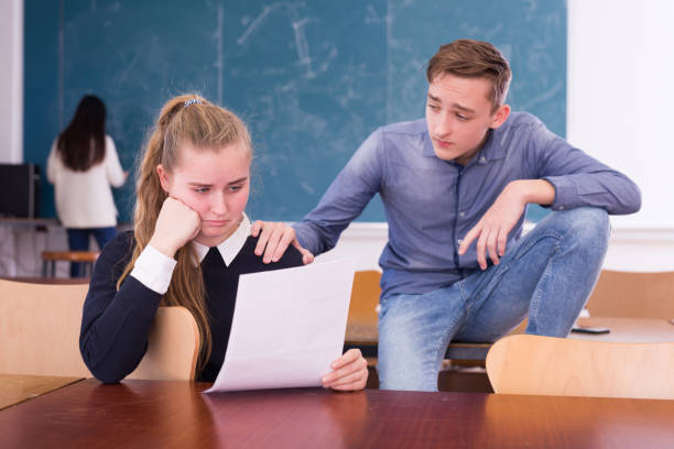 istock Thoughtful university students and preparing for exams 1327319581
