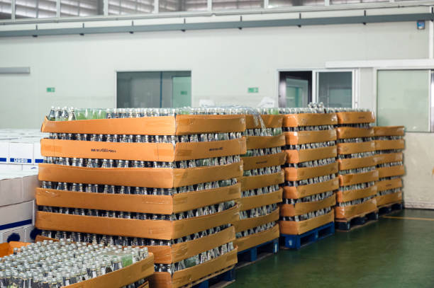 istock Bottled juice beverage stacked in carton packaging at warehouse 1327323860