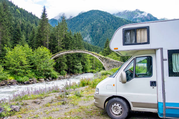istock traveling with van  and camp  at  forests 1327325382