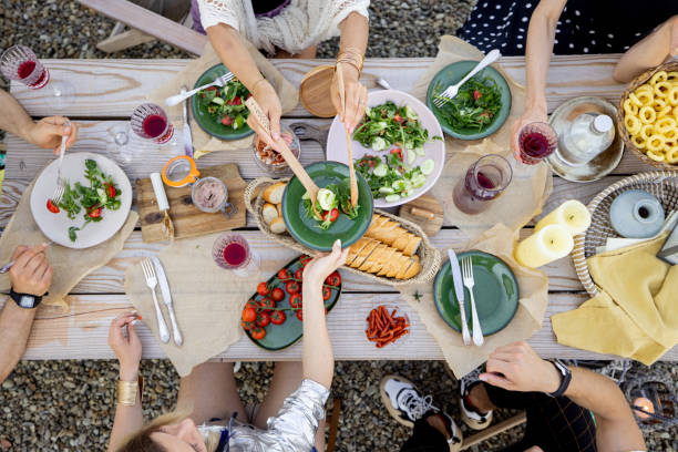 istock Dining table with food outdooors 1327328184
