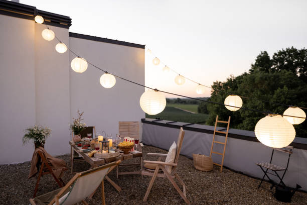 istock Beautifully decorated roof terrace with a dining table 1327329832