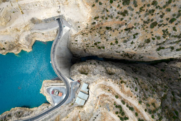 Aerial view of bridge on large dam