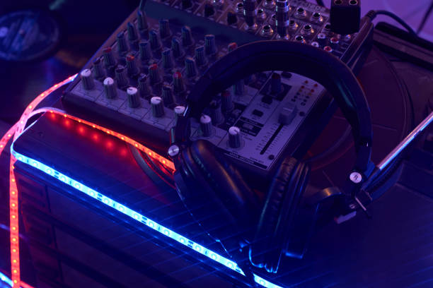 istock Dj mixing console with headphones 1327332852
