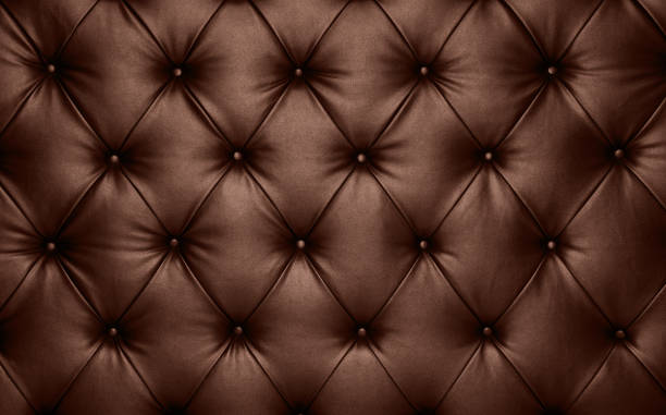 braunes leder capiton hintergrund textur - leather headboard stock-fotos und bilder