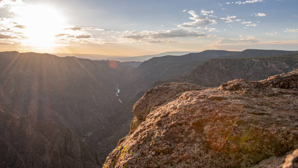 istock Sun Bursts at Sunset Over Black Canyon 1327336990