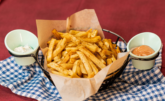 Homemade french fries with ketchup and mayonnaise