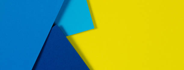 istock Abstract color papers geometry flat lay composition background with blue and yellow tones 1327344923
