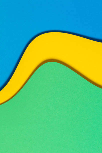istock Abstract color papers geometry flat lay composition background with blue, yellow and green color tones 1327344934