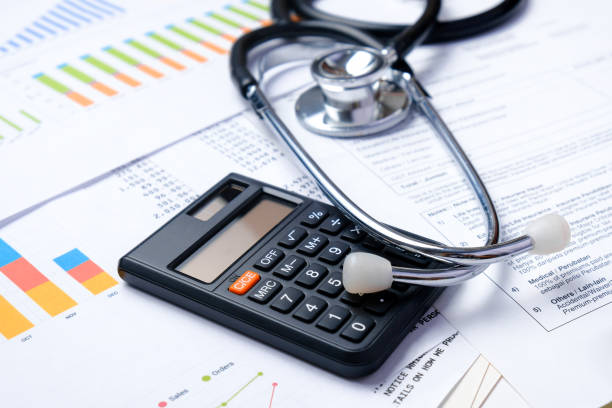istock Stethoscope with Pen, Charts, Graphs, Finance, Account, Statistics, Investment, Analytic Research Data, Medical and Insurances Concept 1327345166
