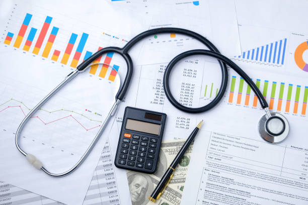istock Stethoscope with Pen, Charts, Graphs, Finance, Account, Statistics, Investment, Analytic Research Data, Medical and Insurances Concept 1327345168