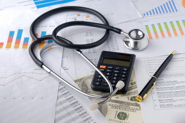 istock Stethoscope with Pen, Charts, Graphs, Finance, Account, Statistics, Investment, Analytic Research Data, Medical and Insurances Concept 1327345184