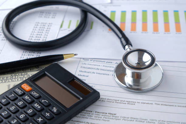 istock Stethoscope with Pen, Charts, Graphs, Finance, Account, Statistics, Investment, Analytic Research Data, Medical and Insurances Concept 1327345199