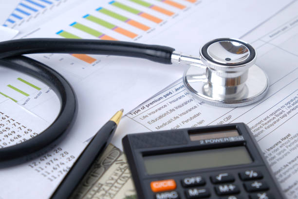 istock Stethoscope with Pen, Charts, Graphs, Finance, Account, Statistics, Investment, Analytic Research Data, Medical and Insurances Concept 1327345203