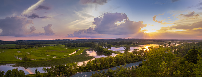 Spectacular panorama of Missouri River floodplain converted to wildlife conservation area at sunset; Missouri, Midwest