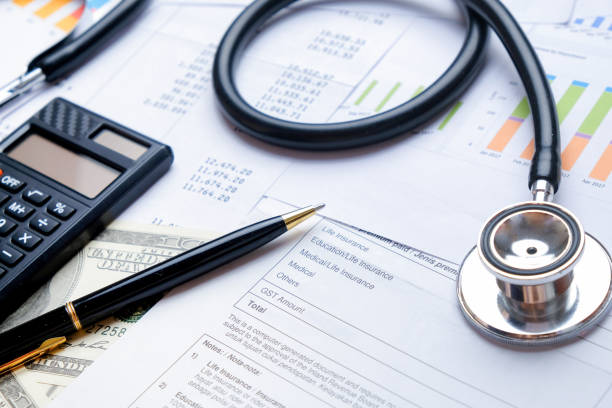 istock Stethoscope with Pen, Charts, Graphs, Finance, Account, Statistics, Investment, Analytic Research Data, Medical and Insurances Concept 1327352853