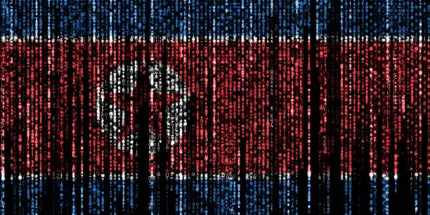 Flag of North Korea on a computer binary codes falling from the top and fading away.
