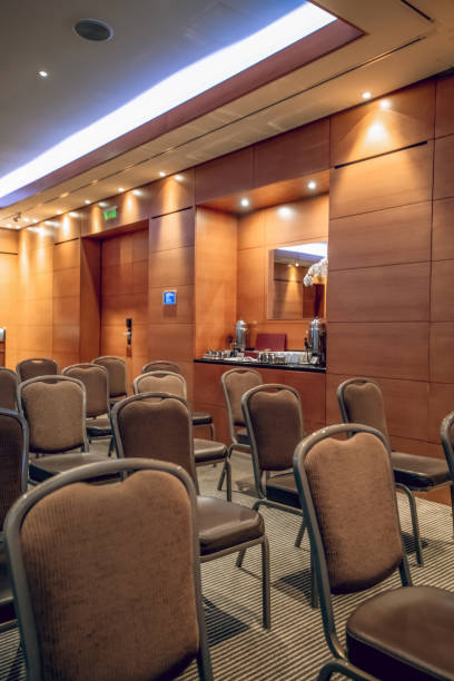 istock Close up of chairs in a nice conference room 1327358340