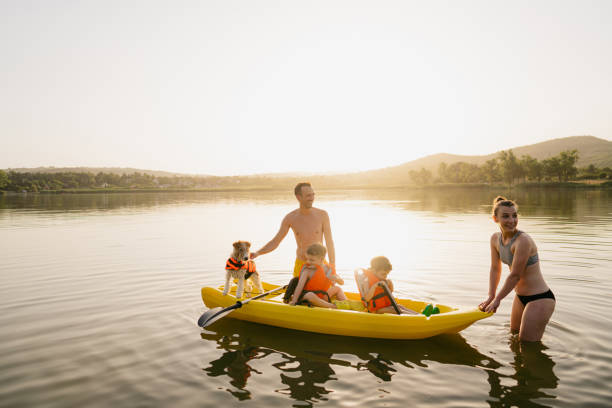 istock Family kayaking on the lake 1327358653