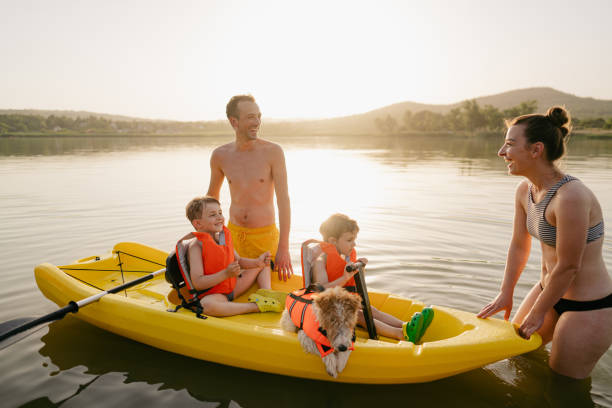 istock Family kayaking on the lake 1327358718