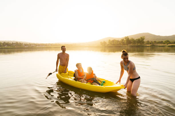 istock Family kayaking on the lake 1327358731